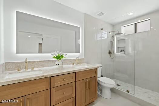 2949 North 29th Street Phoenix, AZ 85016 - Photo 13 of 28 a bathroom with a granite countertop sink toilet and shower