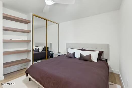 2949 North 29th Street Phoenix, AZ 85016 - Photo 21 of 28 a large bed sitting in a bedroom next to a window