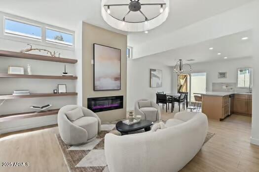 2949 North 29th Street Phoenix, AZ 85016 - Photo 3 of 28 a living room with fireplace furniture and a view of kitchen