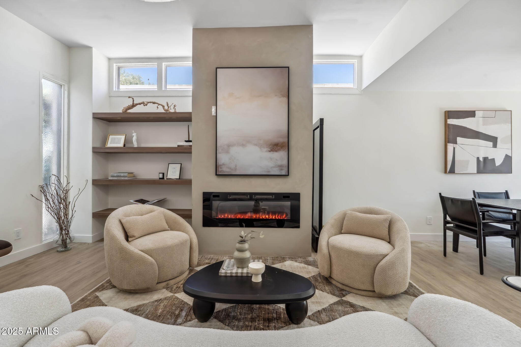2949 North 29th Street Phoenix, AZ 85016 - Photo 4 of 28 a living room with furniture and a fireplace