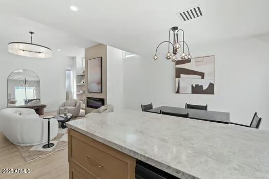2949 North 29th Street Phoenix, AZ 85016 - Photo 9 of 28 a bathroom with a sink and a mirror