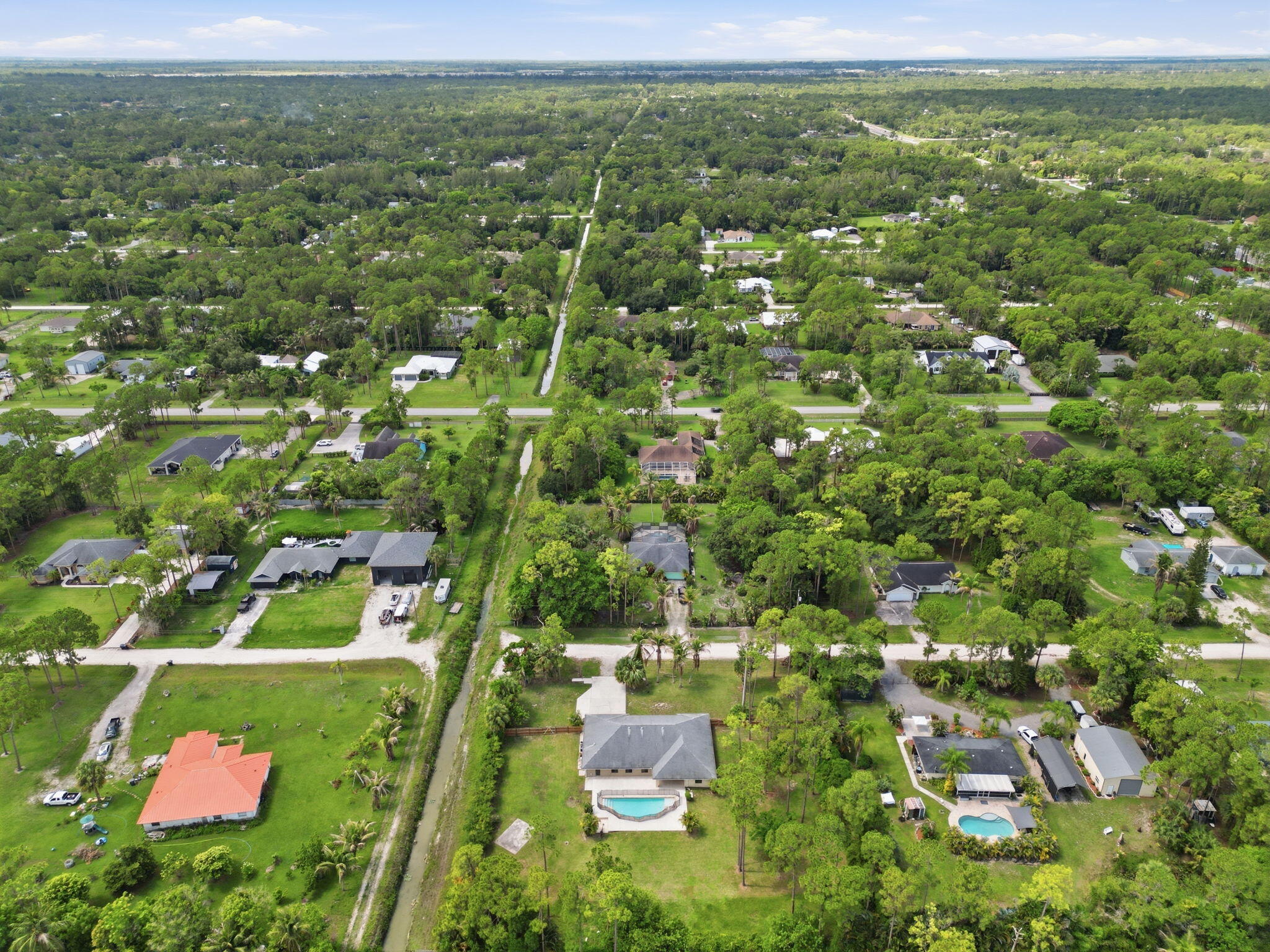 15731 85th Road North Loxahatchee, FL 33470 - Photo 59 of 65 a view of a lush green field