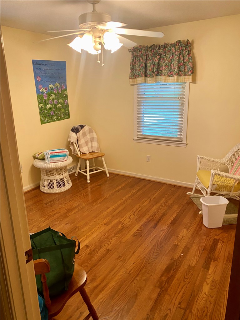 327 Five Forks Road Anderson, SC 29621 - Photo 27 of 31 Rich hardwood flooring adds classic warmth to this versatile space featuring a bright window.