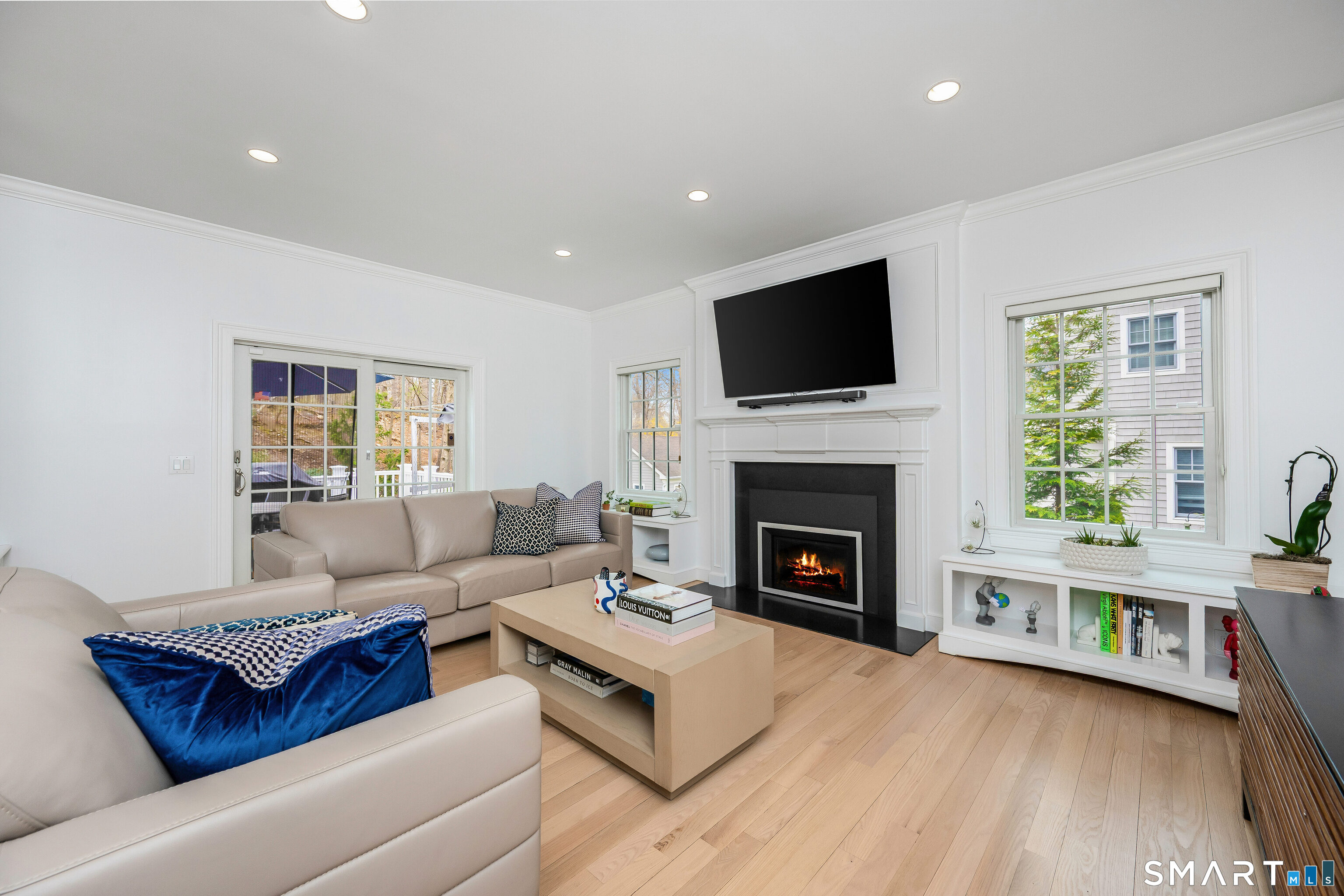 34 Intervale Road Darien, CT 06820 - Photo 11 of 36 a living room with furniture fireplace and flat screen tv