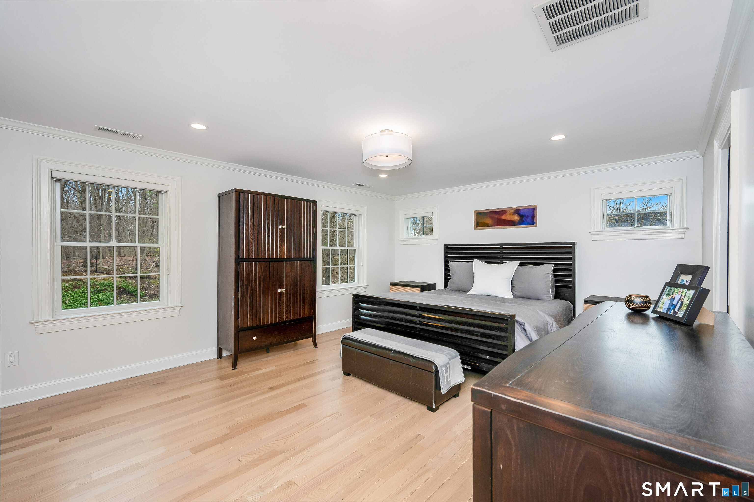 34 Intervale Road Darien, CT 06820 - Photo 13 of 36 a bedroom with furniture and a window
