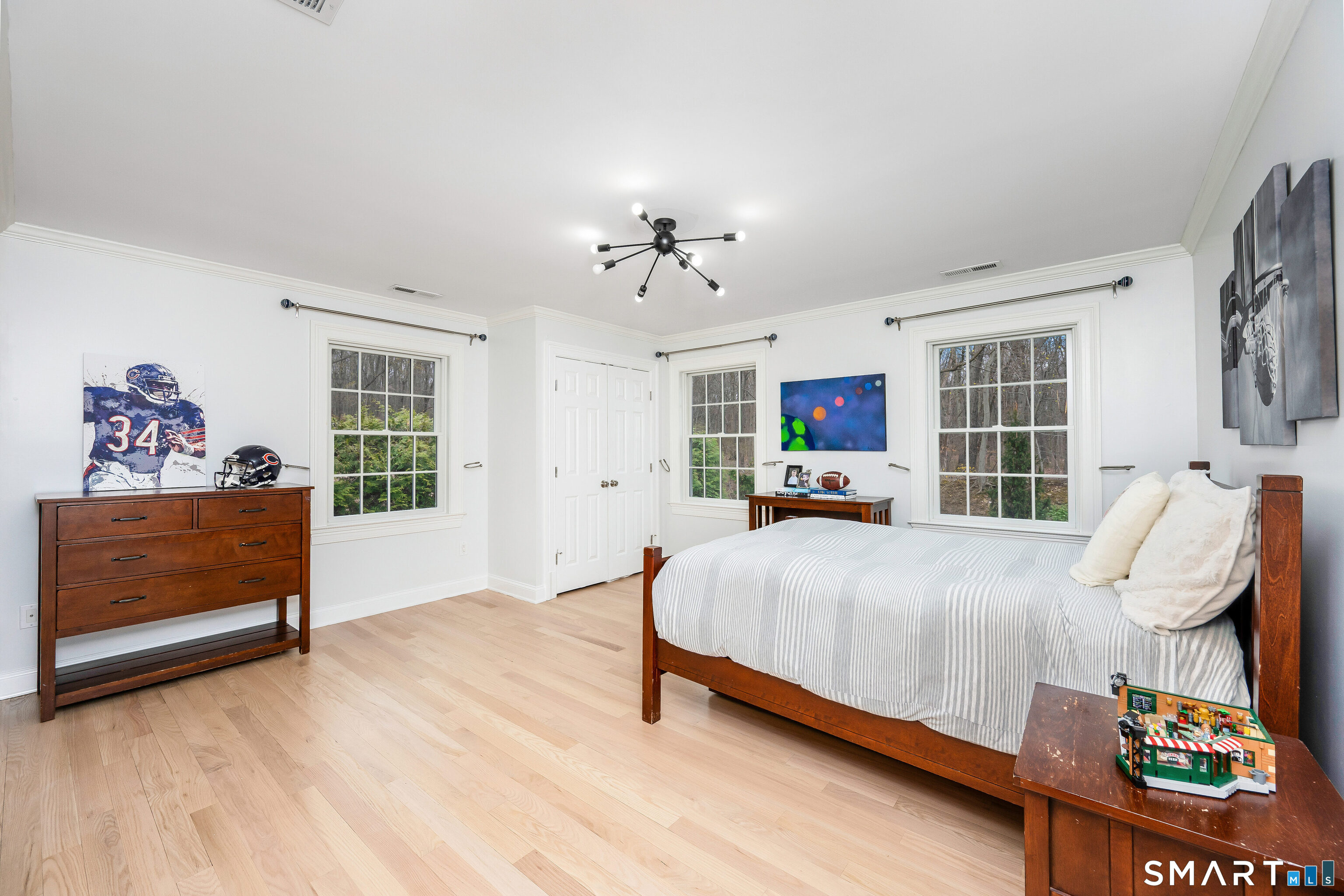 34 Intervale Road Darien, CT 06820 - Photo 17 of 36 a bedroom with a bed and window