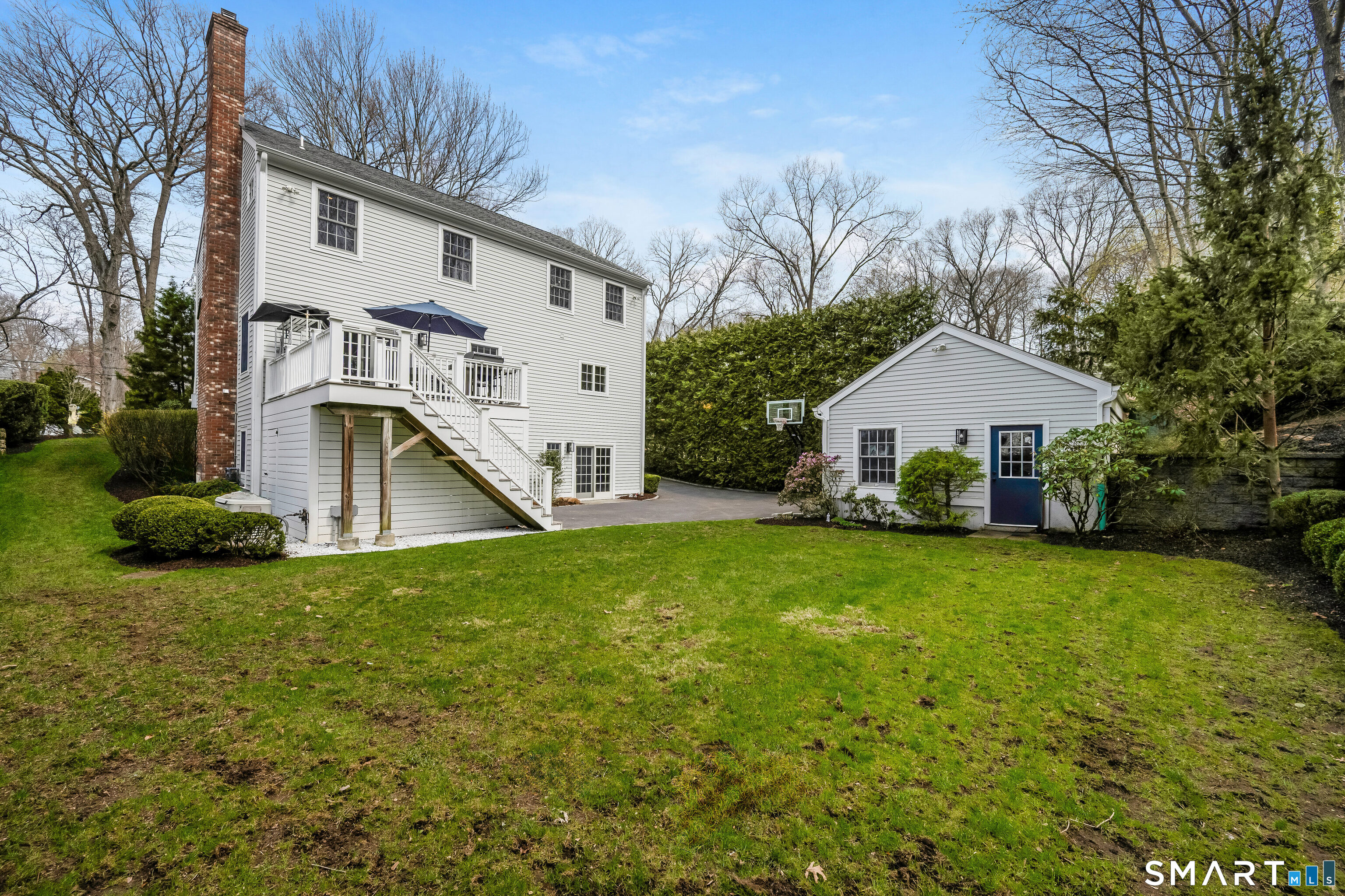 34 Intervale Road Darien, CT 06820 - Photo 30 of 36 a view of a house with backyard and garden