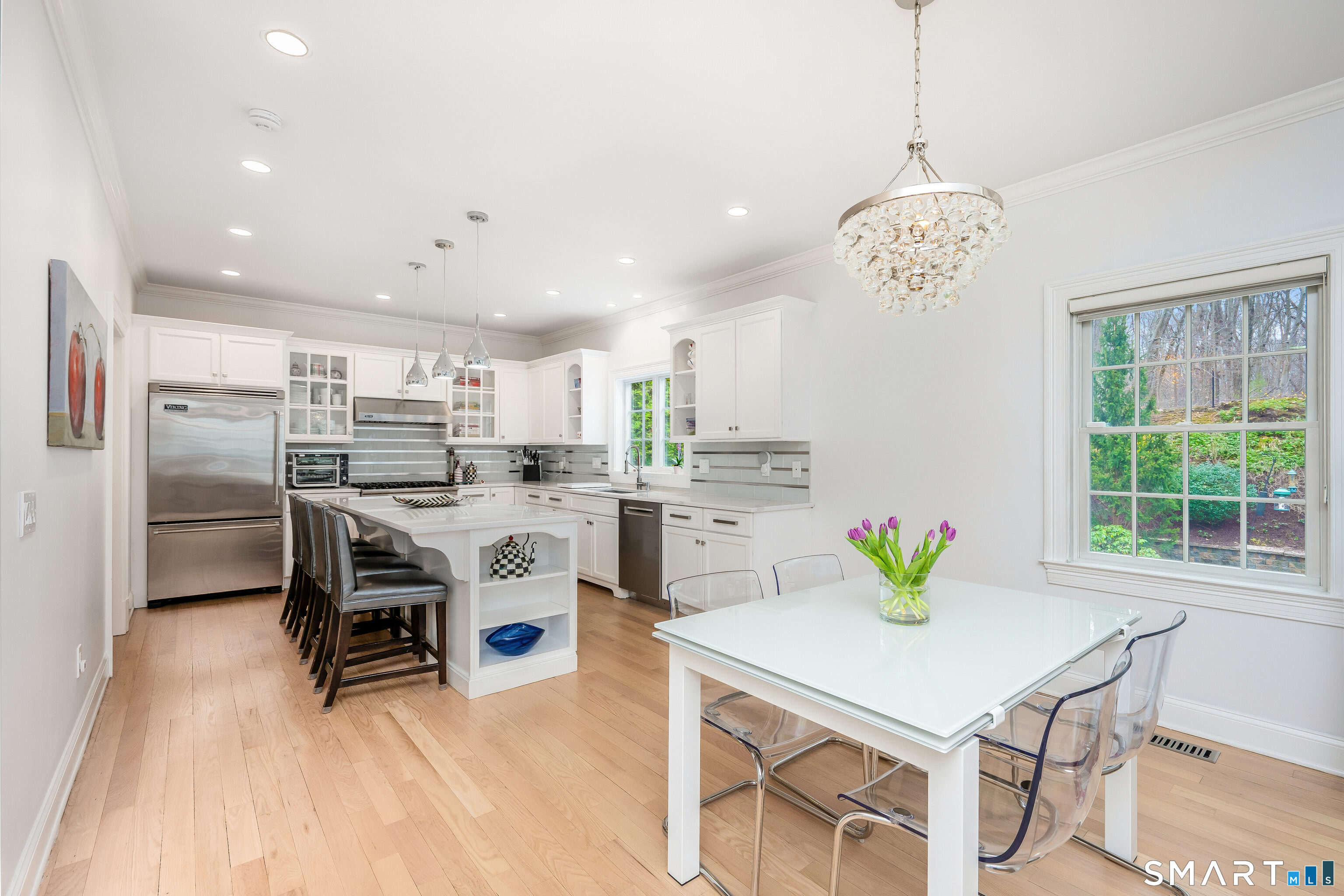34 Intervale Road Darien, CT 06820 - Photo 7 of 36 a view of a dining room with furniture and chandelier