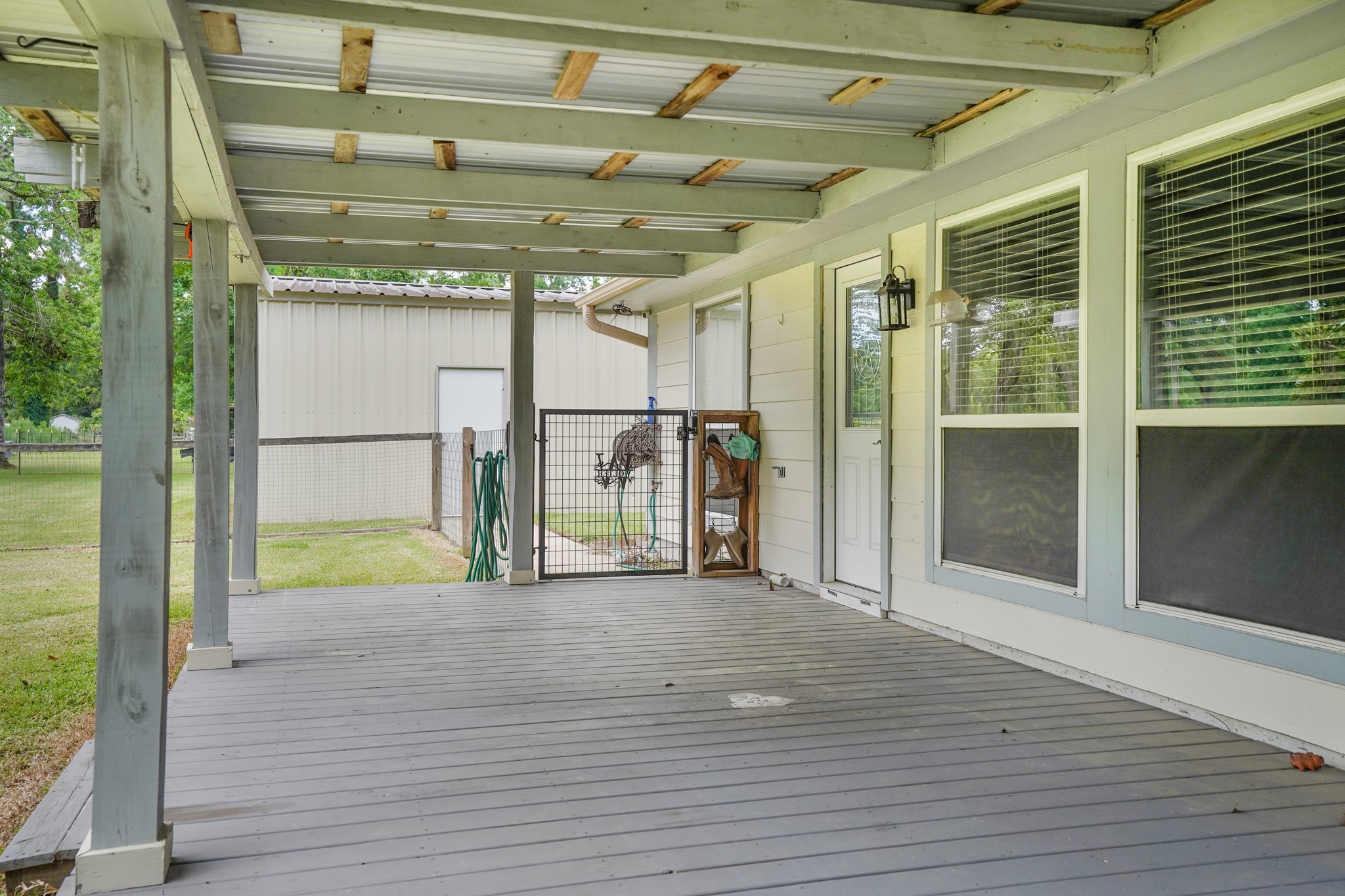 1003 Cherry Creek Road Dayton, TX 77535 - Photo 12 of 45 The view off this back porch is spectacular