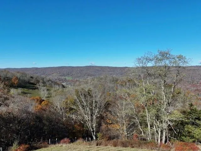 a view of lake with mountain