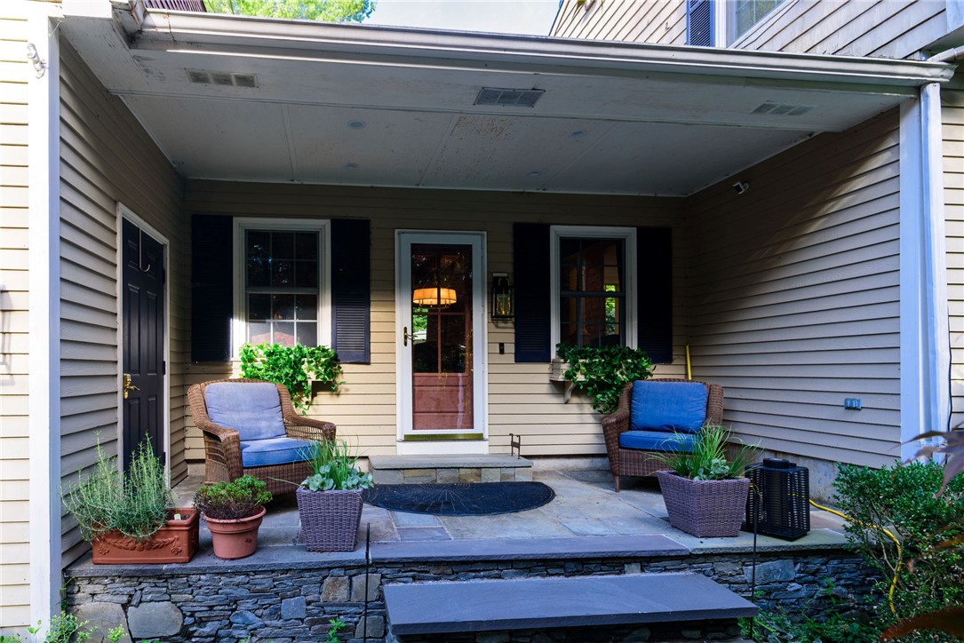31 Raccoon Hill Road West Greenwich, RI 02817 - Photo 15 of 48 Front porch that leads into the dining room