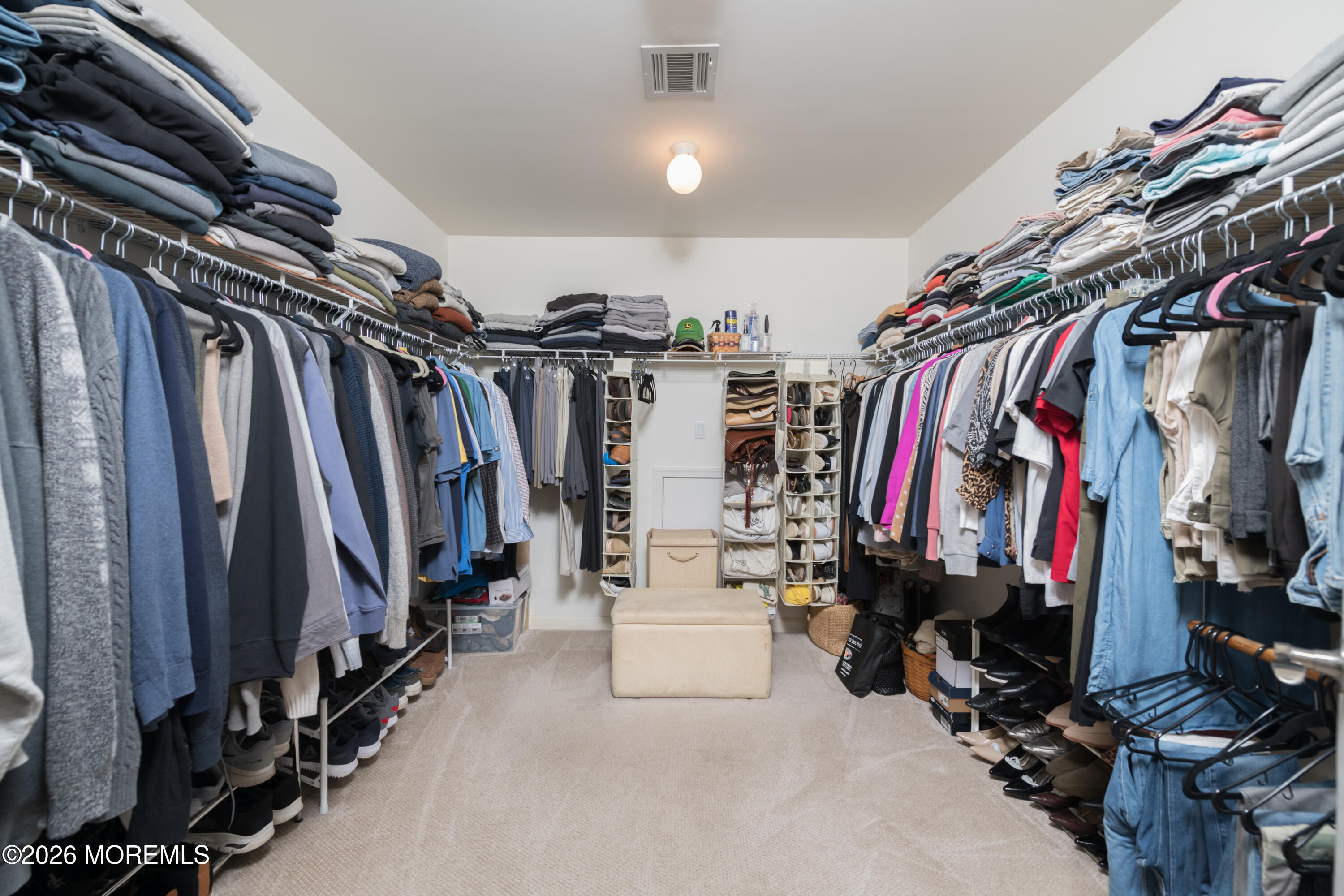 9 Rues Road Cream Ridge, NJ 08514 - Photo 37 of 56 a view of walk in closet with clothes