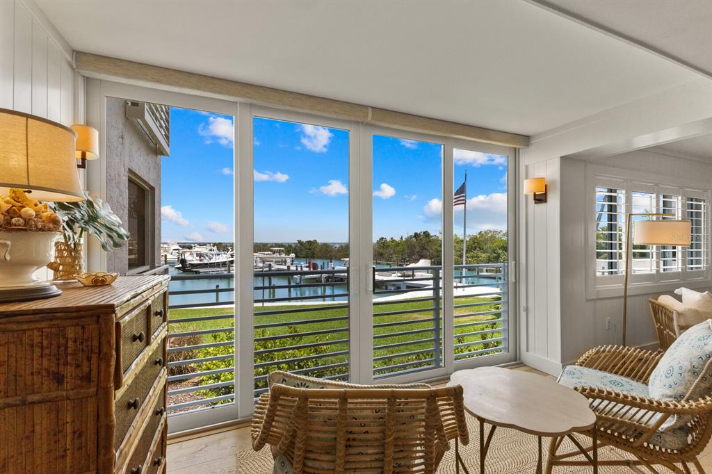 5850 Gasparilla Road, Unit M1&3 Boca Grande, FL 33921 - Photo 13 of 57 a view of a living room and kitchen area