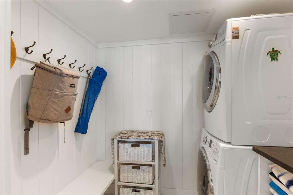 5850 Gasparilla Road, Unit M1&3 Boca Grande, FL 33921 - Photo 18 of 57 a utility room with dryer and washer