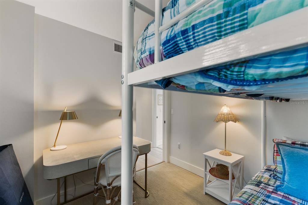 5850 Gasparilla Road, Unit M1&3 Boca Grande, FL 33921 - Photo 28 of 57 a room with table and chair