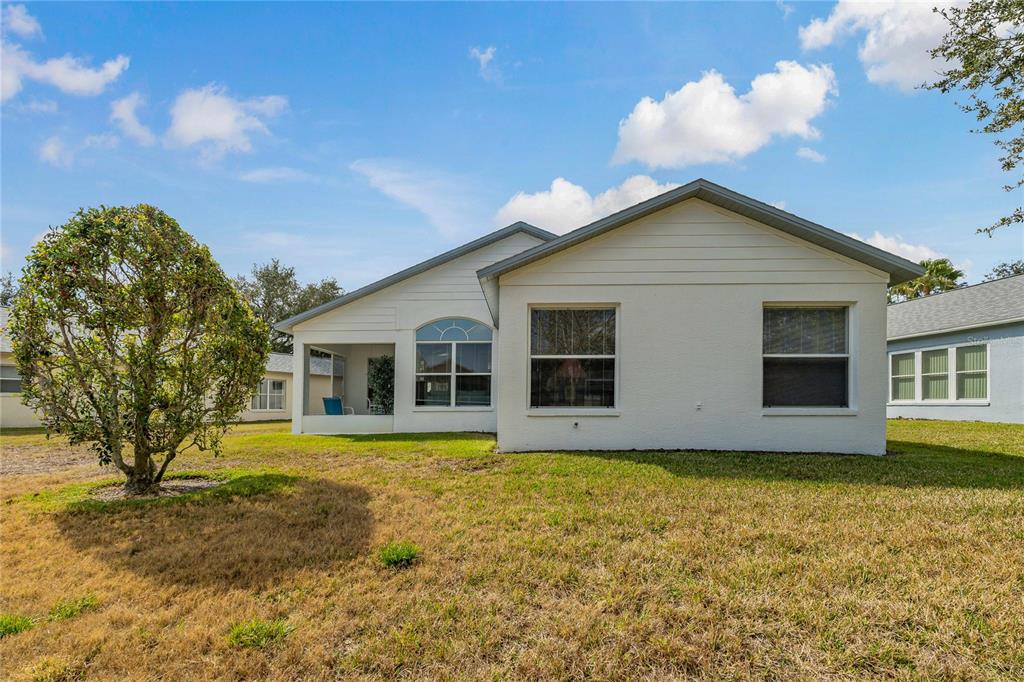11744 Wheatfield Loop Hudson, FL 34667 - Photo 28 of 48 Back of Home