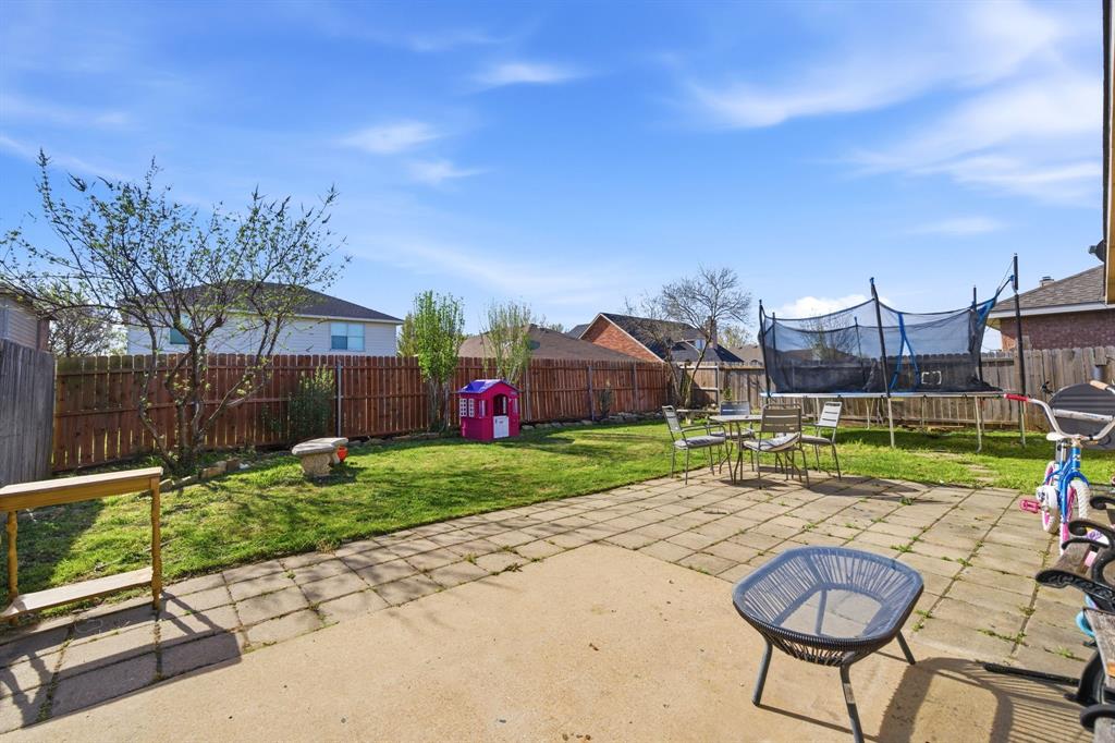 2008 Times Road Heartland, TX 75126 - Photo 25 of 28 a view of a backyard with sitting area