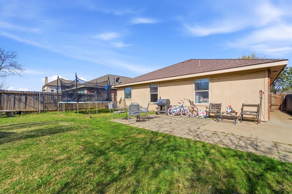 2008 Times Road Heartland, TX 75126 - Photo 27 of 28 a view of a house with backyard and sitting area