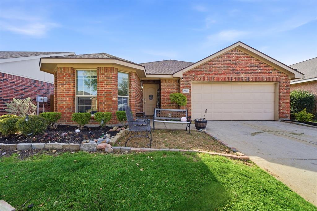 2008 Times Road Heartland, TX 75126 - Photo 3 of 28 a view of a house with a yard