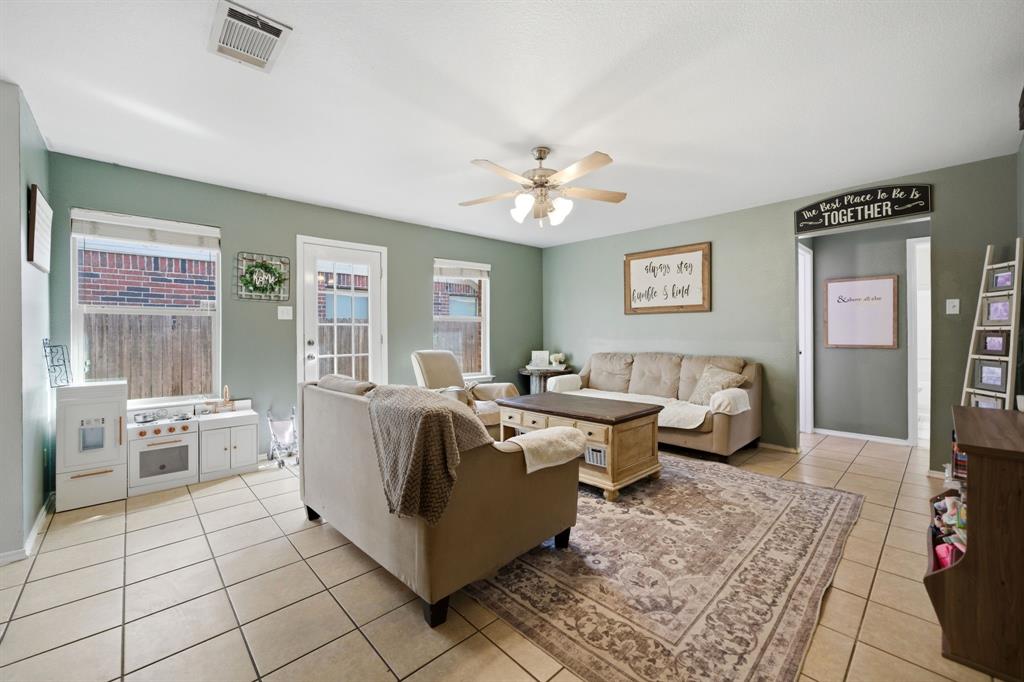2008 Times Road Heartland, TX 75126 - Photo 7 of 28 a living room with furniture and a table