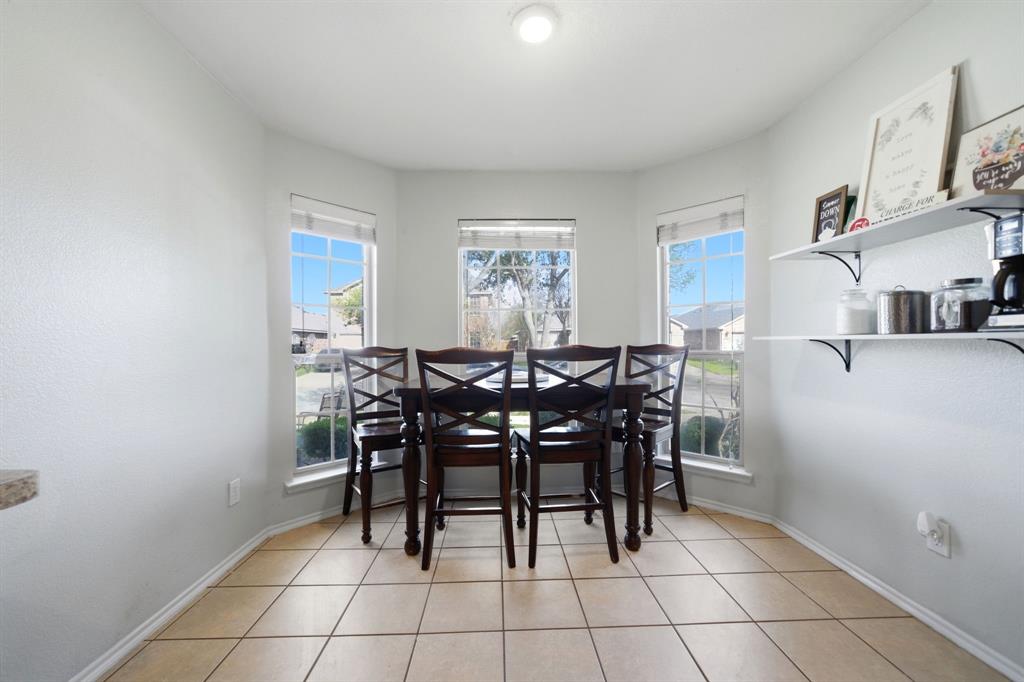 2008 Times Road Heartland, TX 75126 - Photo 10 of 28 a view of a dining area with furniture