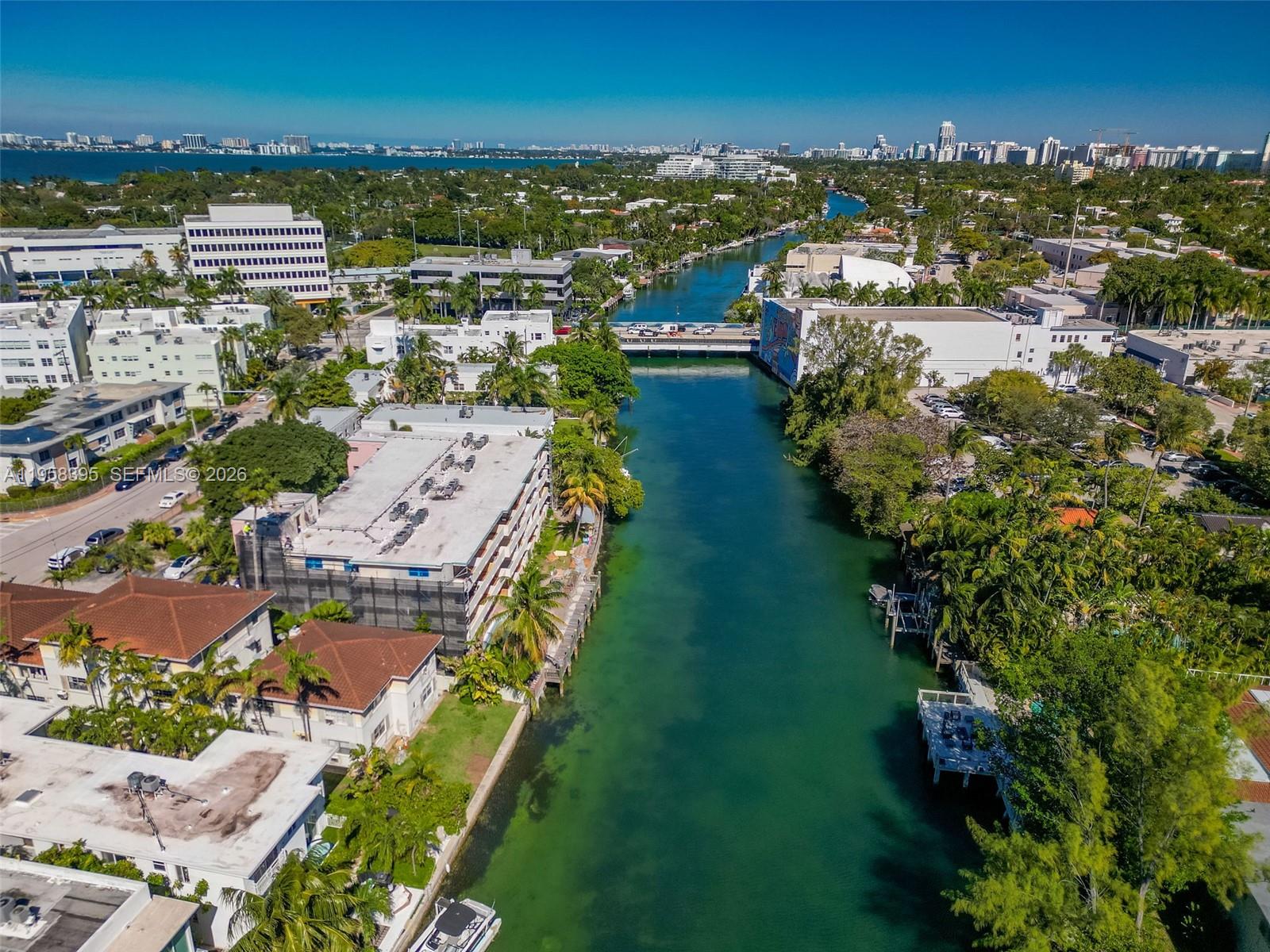 4011 Meridian Avenue, Unit 38 Miami Beach, FL 33140 - Photo 18 of 22 an aerial view of residential houses with outdoor space