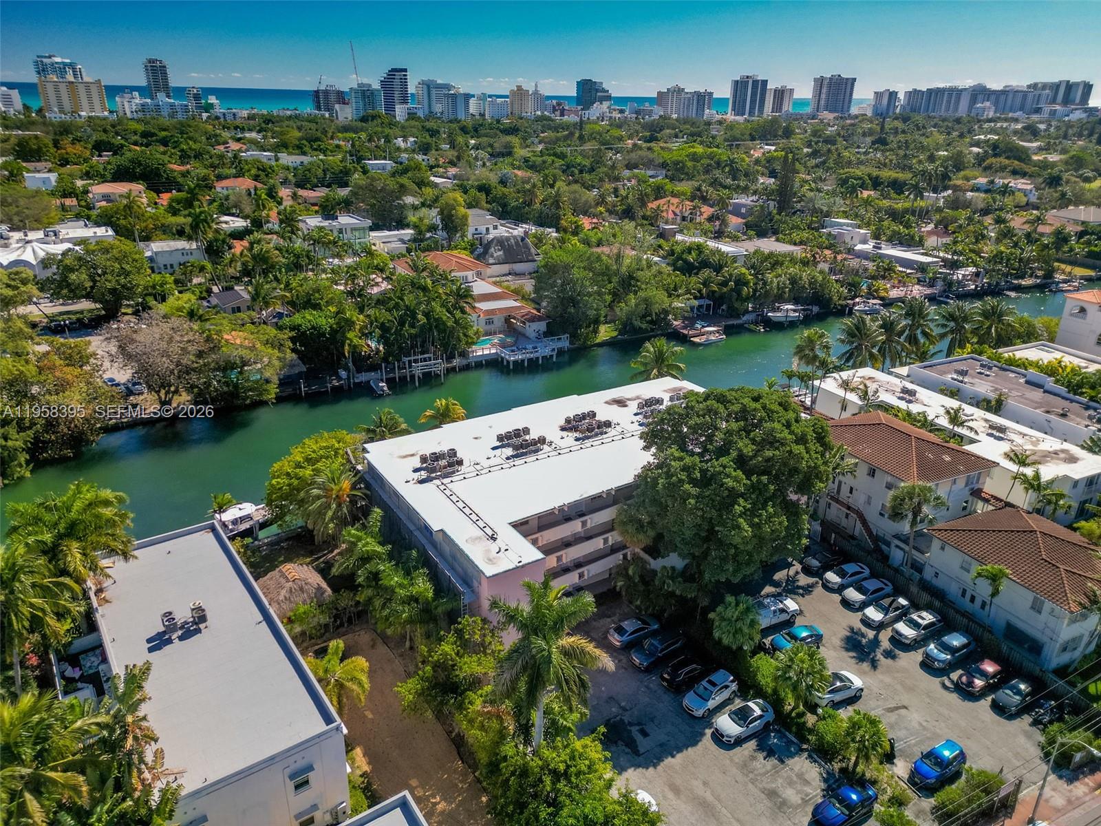 4011 Meridian Avenue, Unit 38 Miami Beach, FL 33140 - Photo 20 of 22 an aerial view of a house with a garden