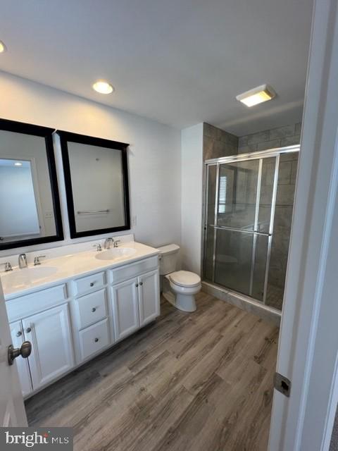 3228 Light Way Mechanicsburg, PA 17055 - Photo 18 of 33 a spacious bathroom with a double vanity sink a mirror and a toilet
