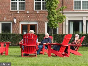 3228 Light Way Mechanicsburg, PA 17055 - Photo 25 of 33 a view of swimming pool with red chairs and a yard