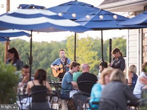 3228 Light Way Mechanicsburg, PA 17055 - Photo 26 of 33 a living room with furniture and a floor to ceiling window