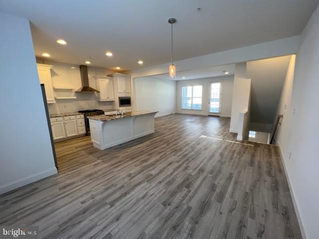 3228 Light Way Mechanicsburg, PA 17055 - Photo 4 of 33 a view of kitchen and living room with wooden floor