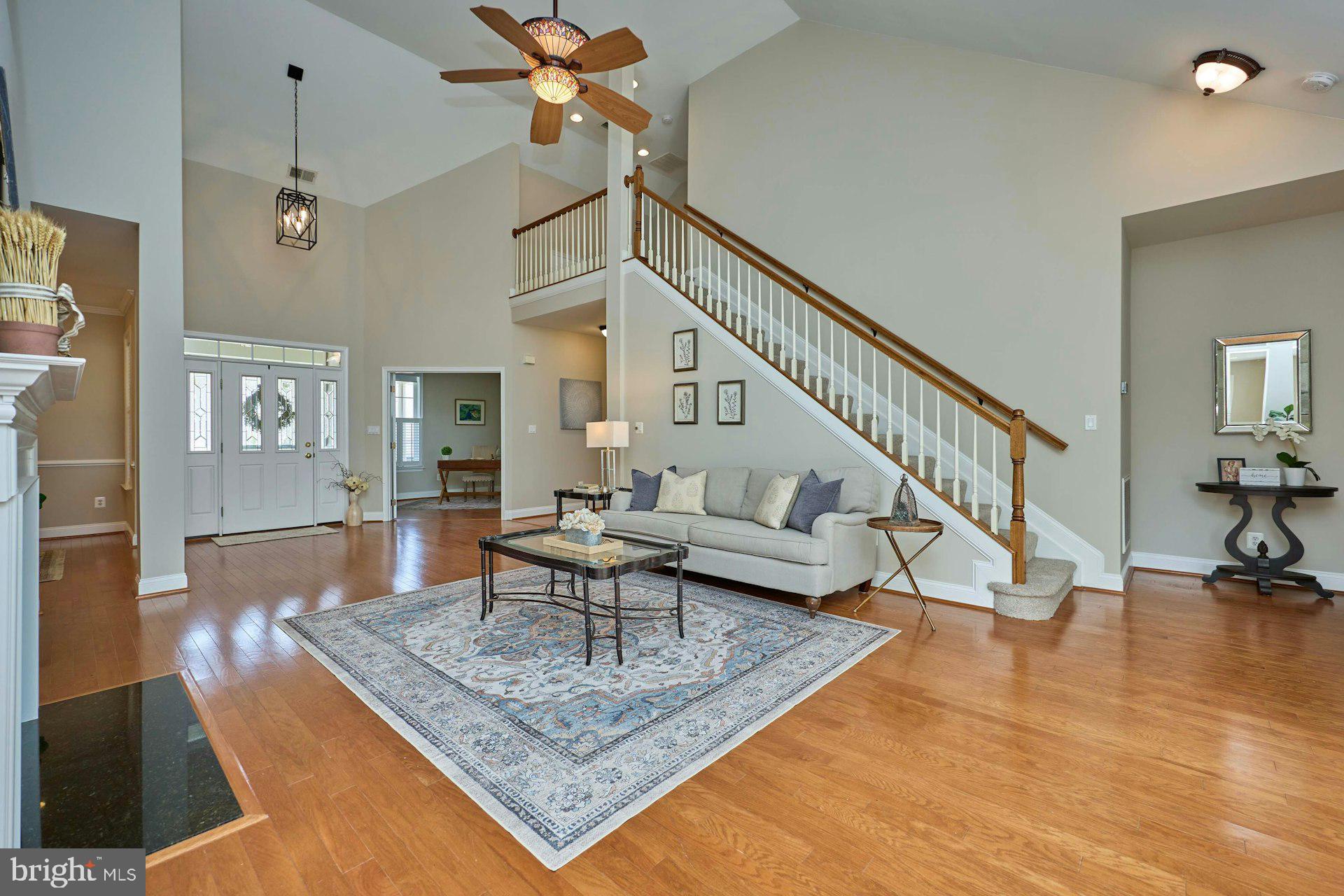 6907 Broadleaf Terrace Gainesville, VA 20155 - Photo 13 of 54 Gorgeous Hardwood Flooring on main level