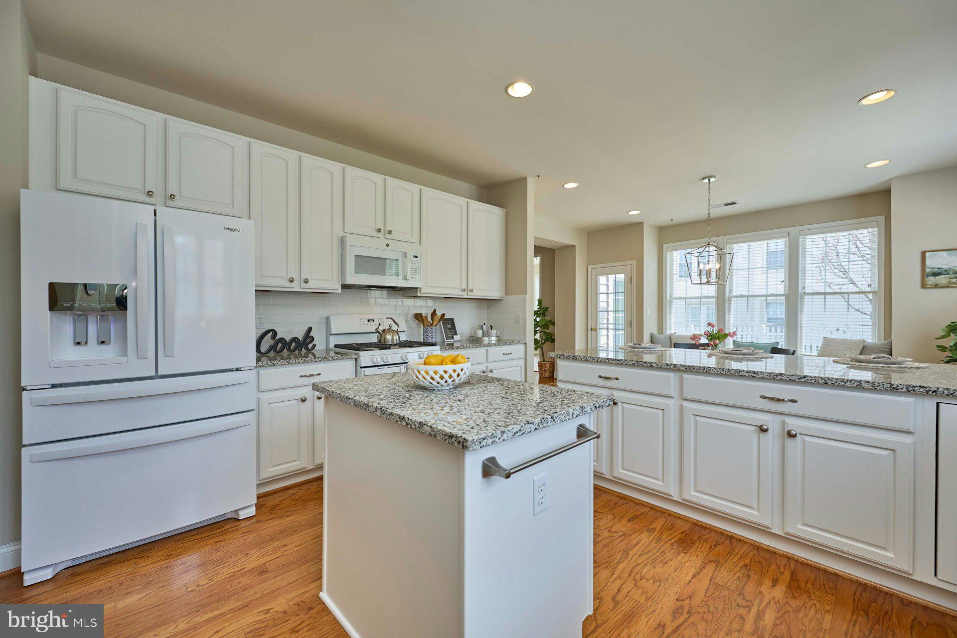 6907 Broadleaf Terrace Gainesville, VA 20155 - Photo 18 of 54 Lots of Cabinets for storage + center island