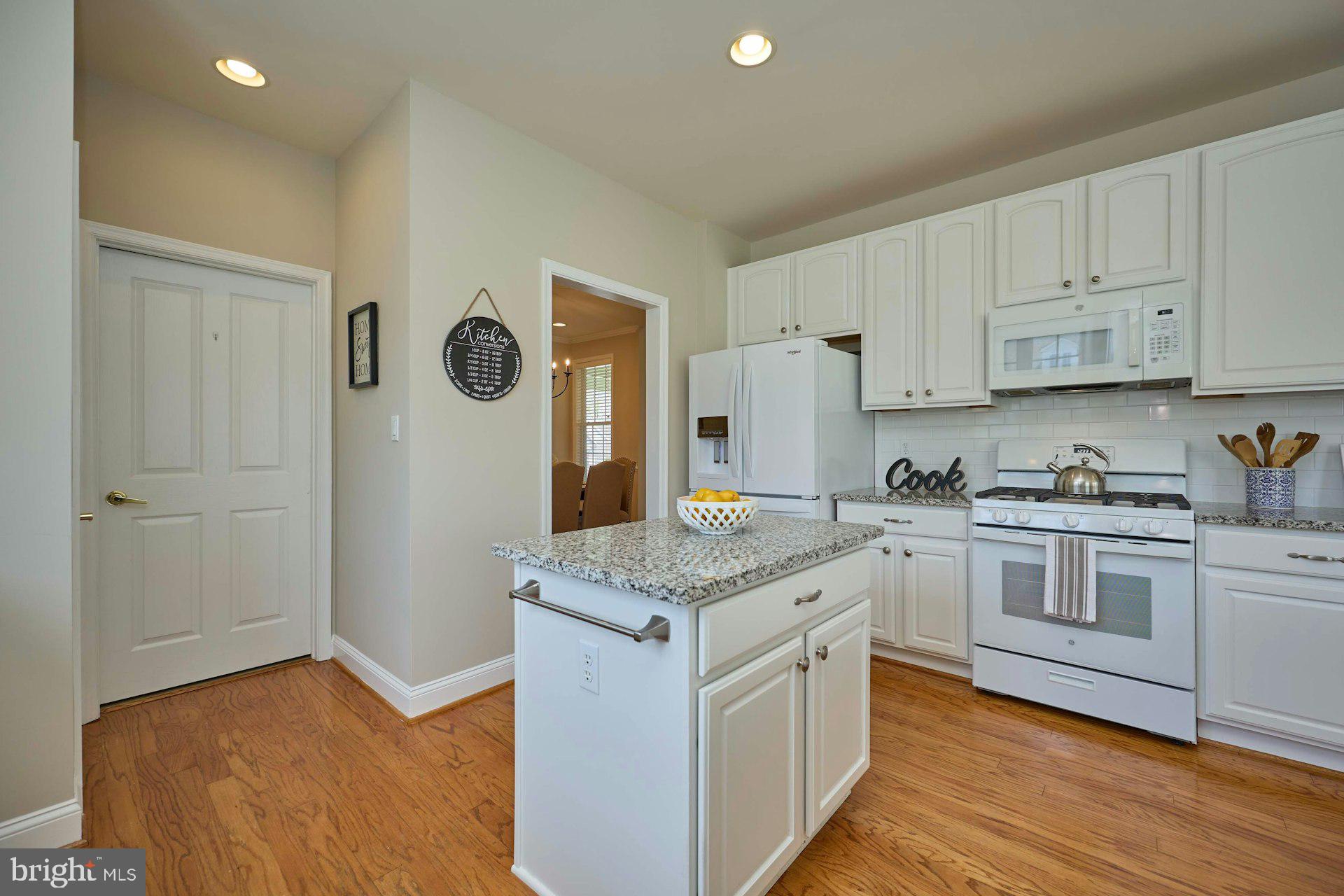 6907 Broadleaf Terrace Gainesville, VA 20155 - Photo 19 of 54 You will love the white cabinets & sunlit Kitchen