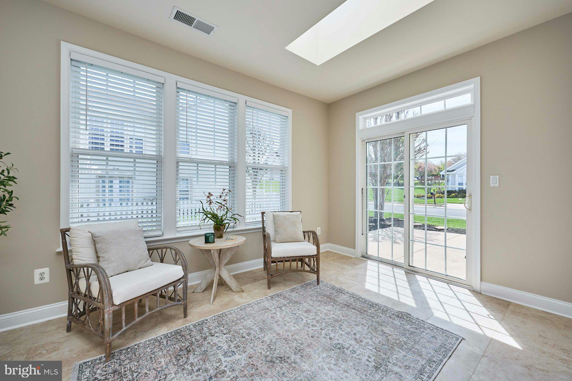 6907 Broadleaf Terrace Gainesville, VA 20155 - Photo 22 of 54 Skylights in Sunroom brings tons of Natural Light