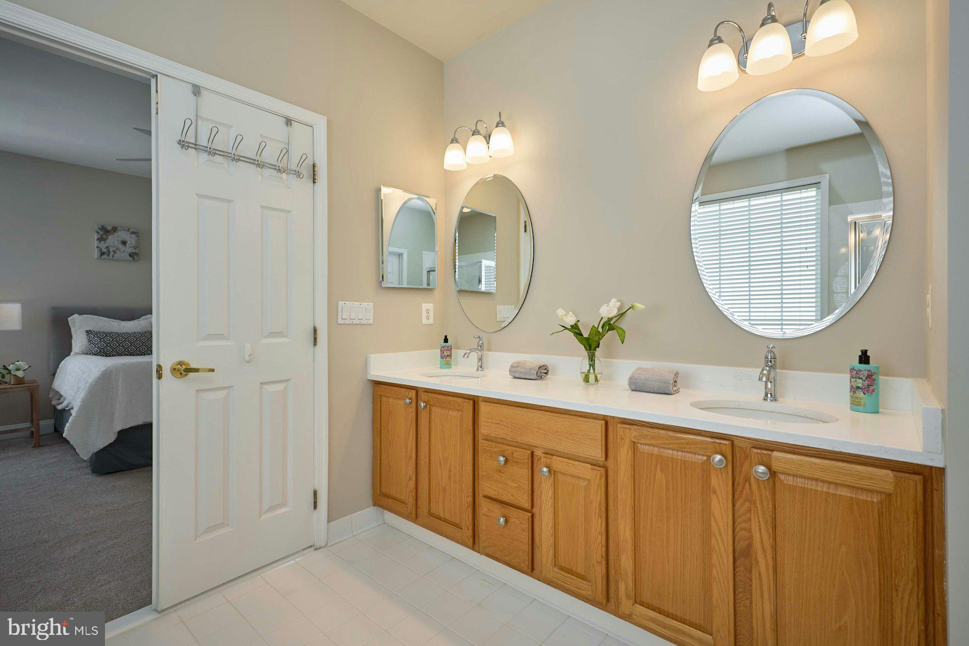 6907 Broadleaf Terrace Gainesville, VA 20155 - Photo 29 of 54 Double sink vanity, new lights & Quartz Countertop