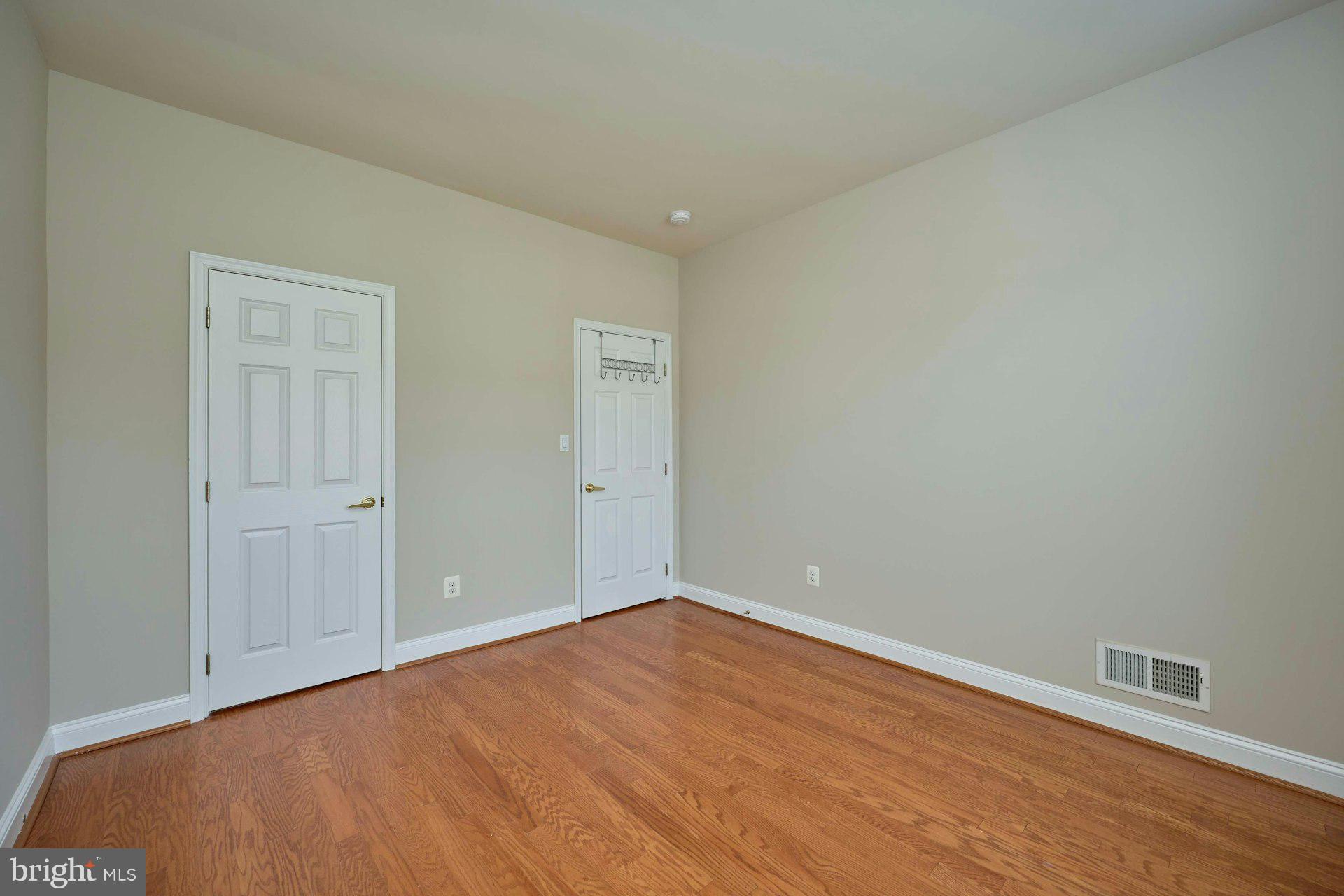 6907 Broadleaf Terrace Gainesville, VA 20155 - Photo 32 of 54 Freshly painted, hardwood floors in 2nd Bedroom