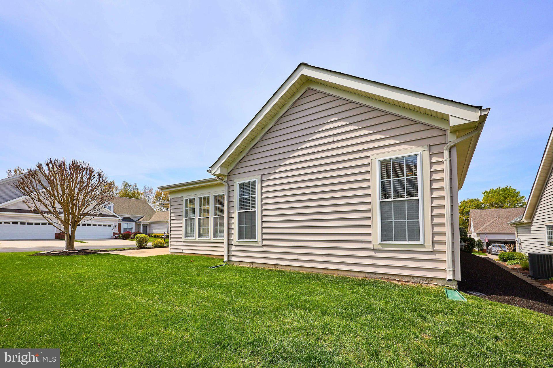 6907 Broadleaf Terrace Gainesville, VA 20155 - Photo 45 of 54 Lush green grass surrounds the home