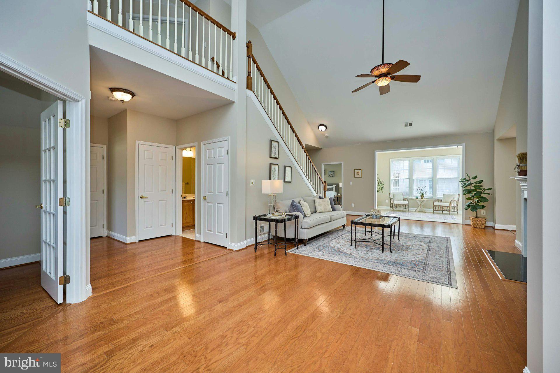 6907 Broadleaf Terrace Gainesville, VA 20155 - Photo 5 of 54 Vaulted Ceiling in the Great Room & warm Hardwoods