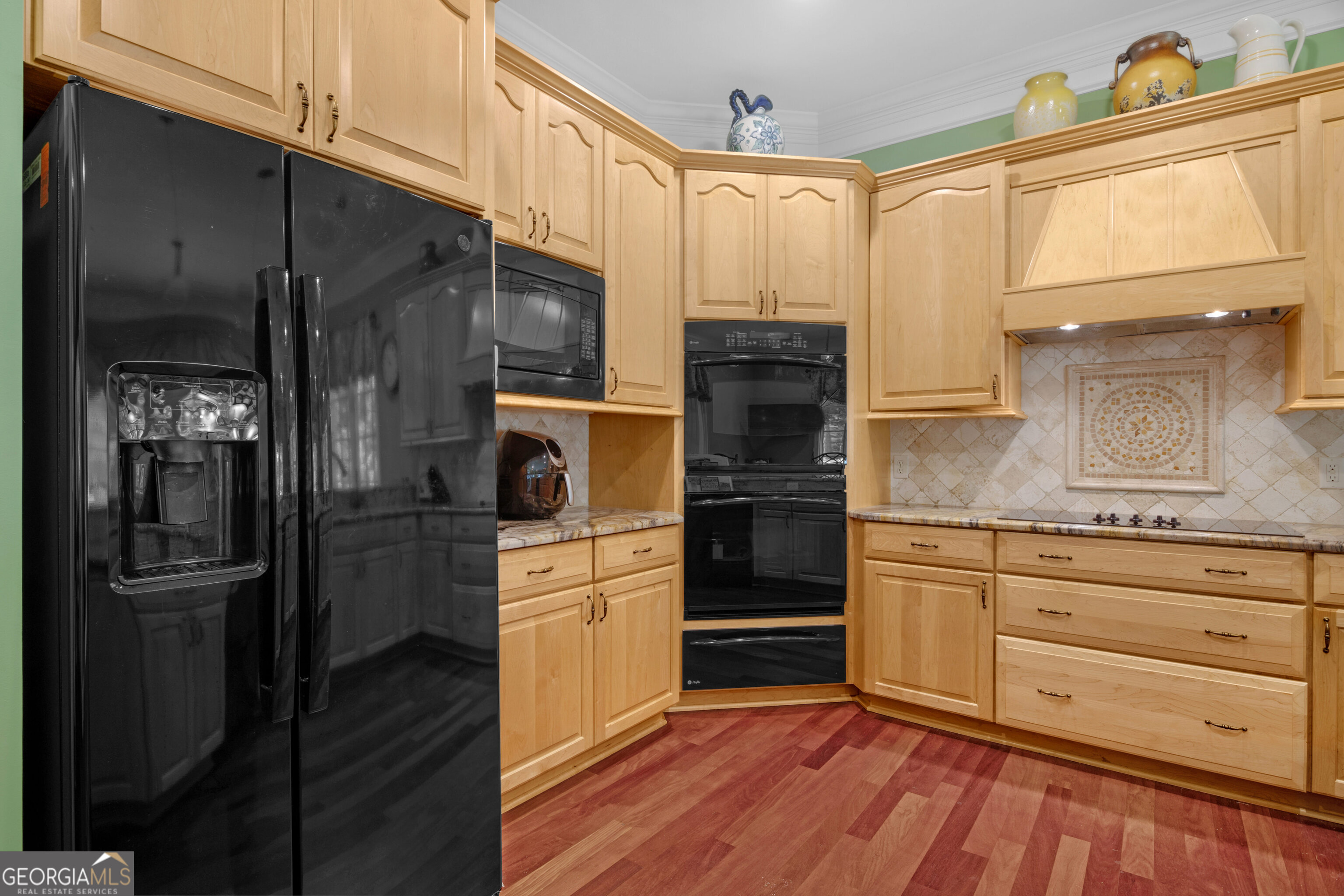 312 Spanton Crescent Pooler, GA 31322 - Photo 11 of 62 a kitchen with granite countertop a refrigerator and a sink