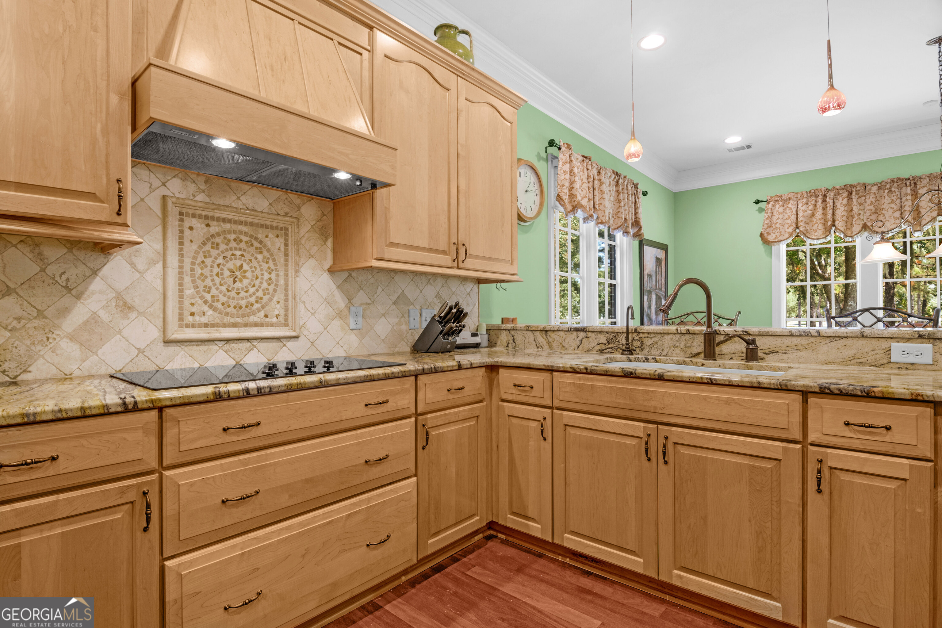 312 Spanton Crescent Pooler, GA 31322 - Photo 12 of 62 a kitchen with granite countertop white cabinets and white appliances