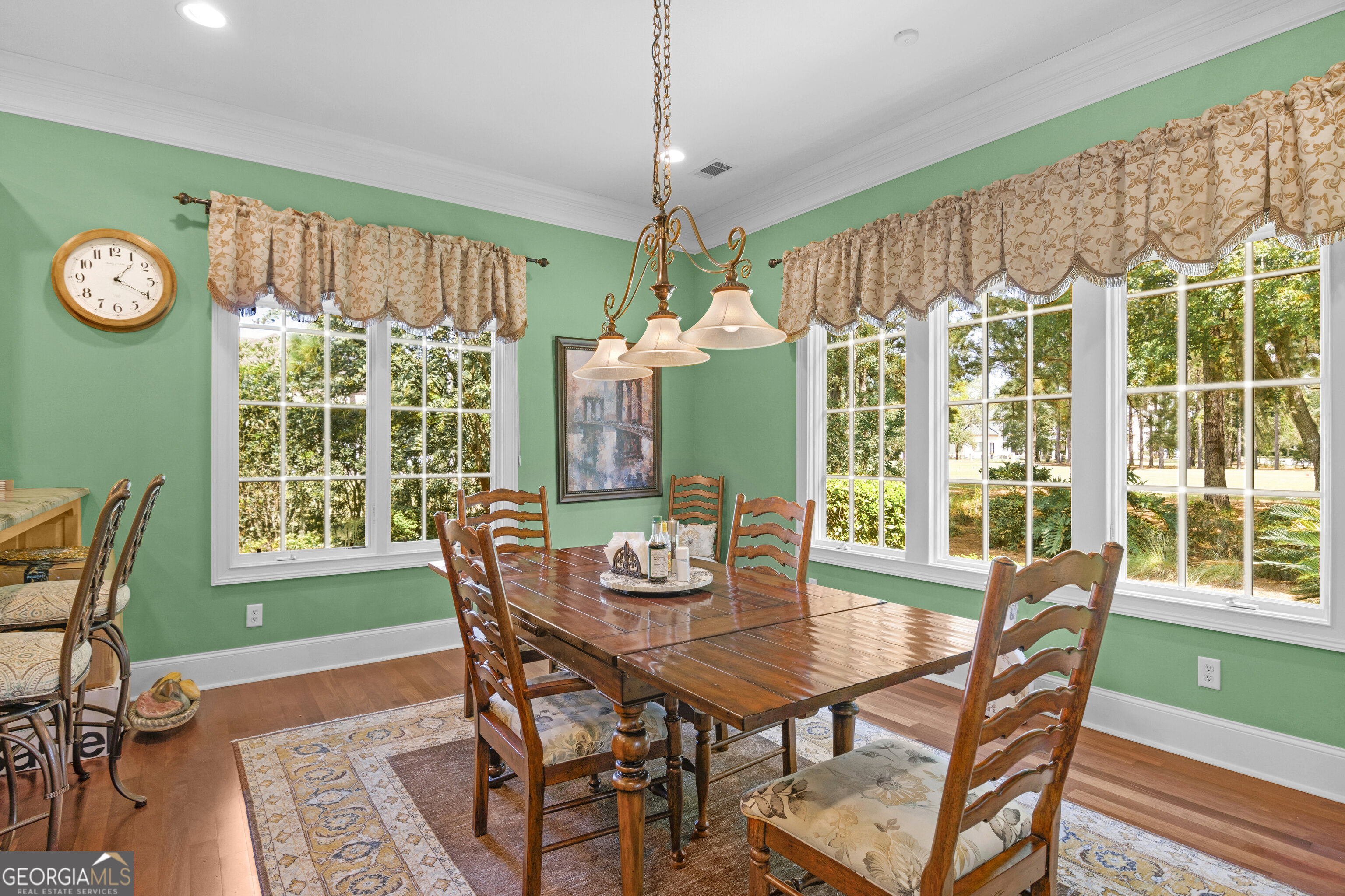 312 Spanton Crescent Pooler, GA 31322 - Photo 18 of 62 a dining room with furniture window and wooden floor