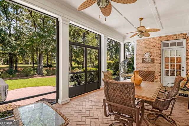 a view of walk in closet with clothes