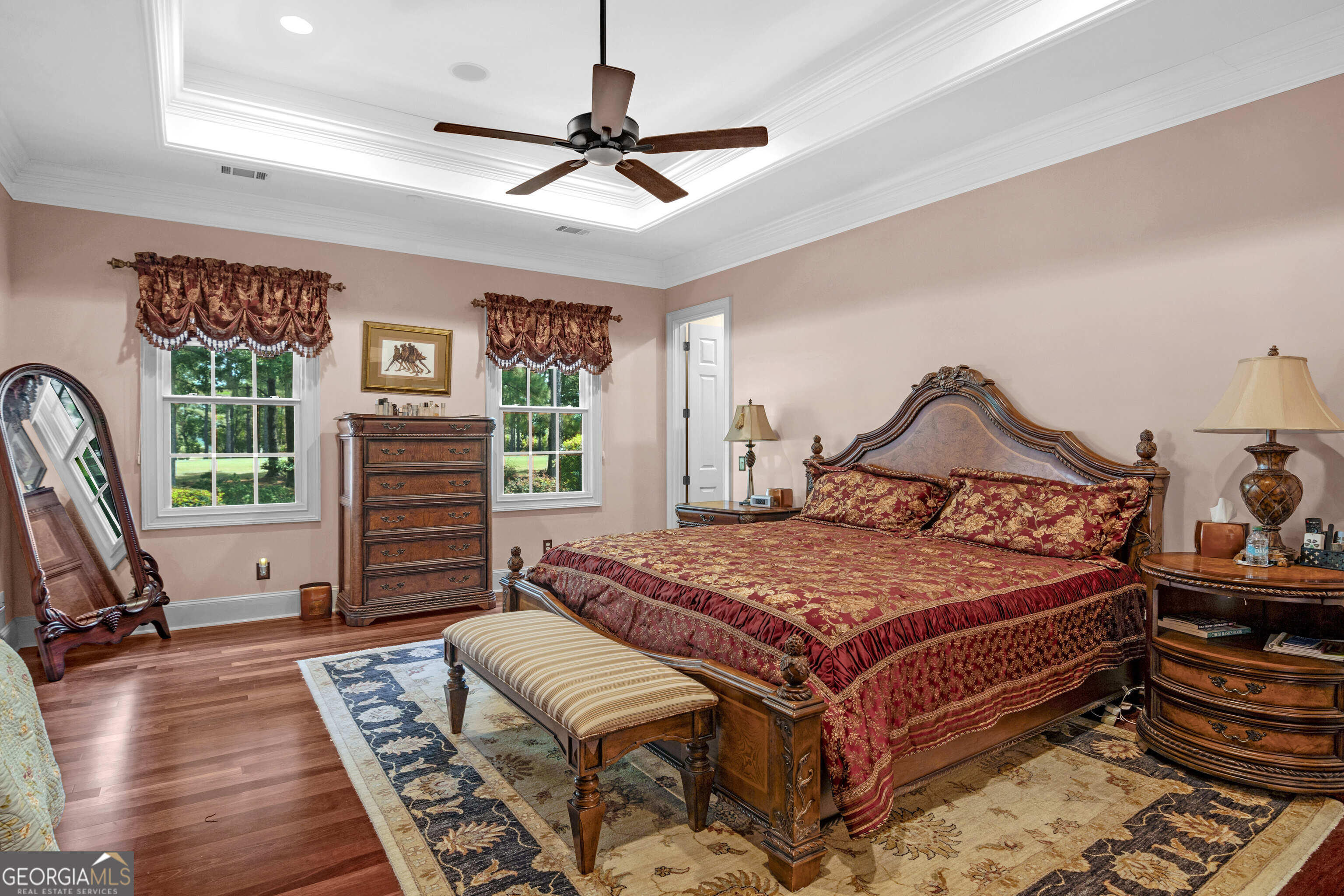 312 Spanton Crescent Pooler, GA 31322 - Photo 23 of 62 a bedroom with a bed a flat screen tv and a large window