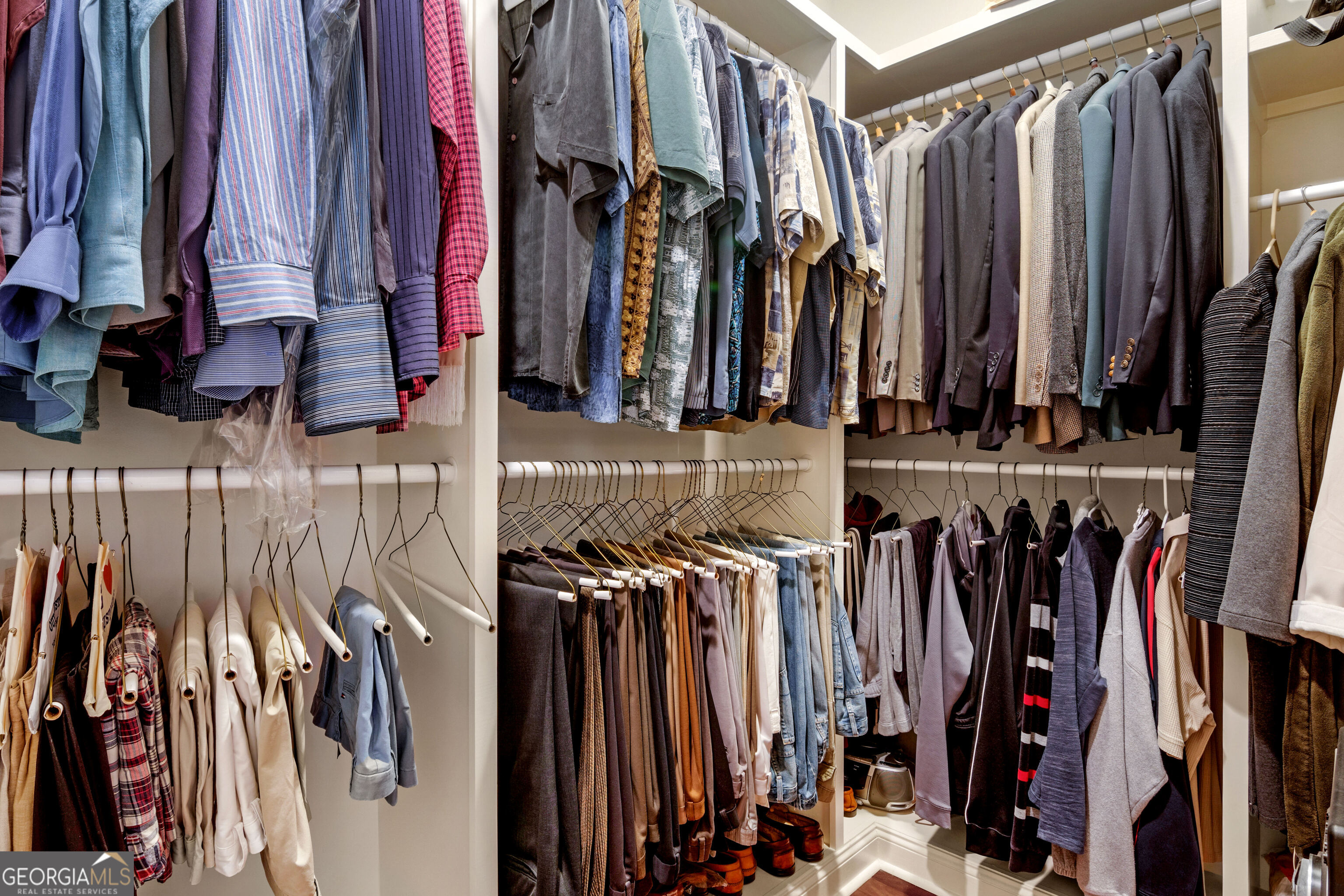 312 Spanton Crescent Pooler, GA 31322 - Photo 25 of 62 a view of walk in closet with clothes
