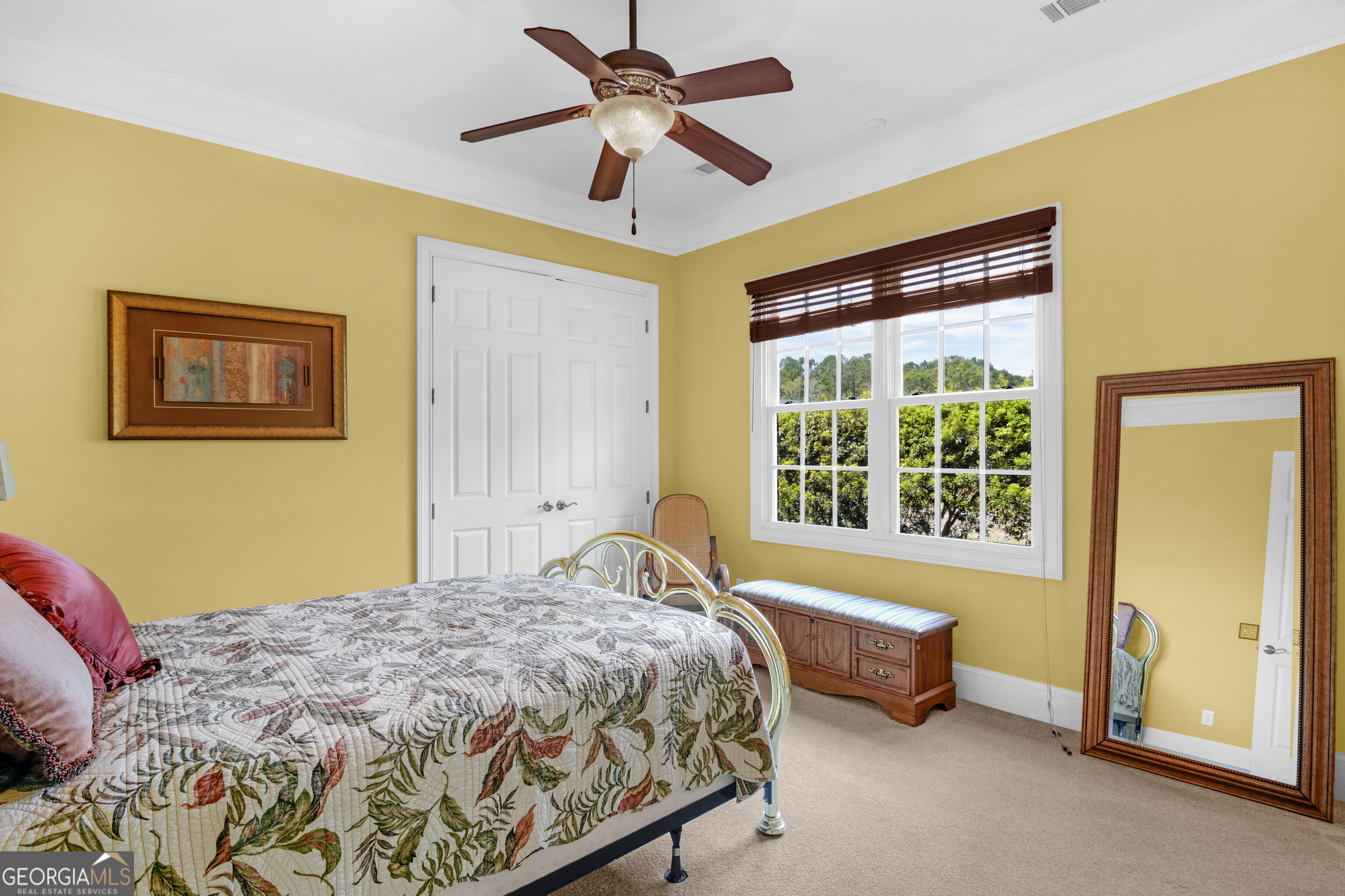 312 Spanton Crescent Pooler, GA 31322 - Photo 30 of 62 a bedroom with a bed and a chandelier