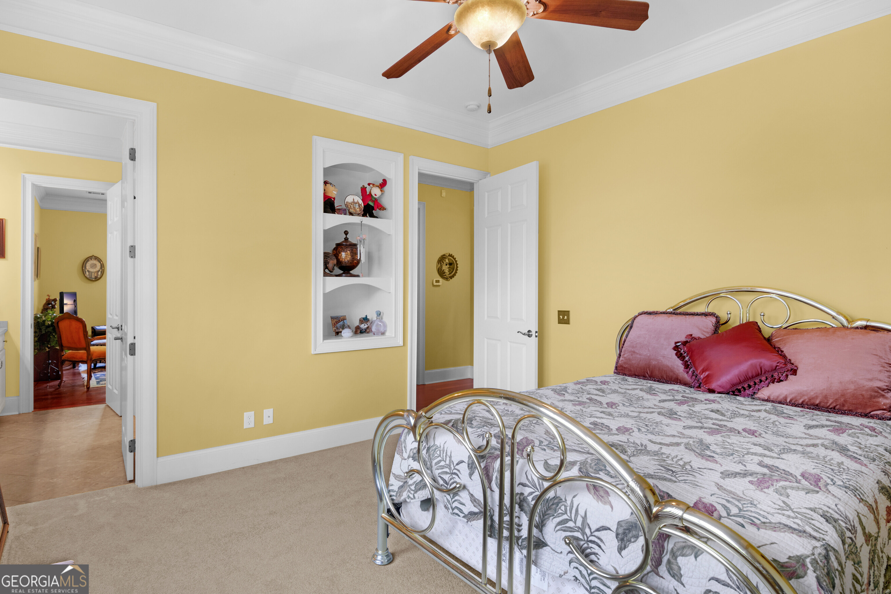 312 Spanton Crescent Pooler, GA 31322 - Photo 31 of 62 a bedroom with a bed and a chandelier