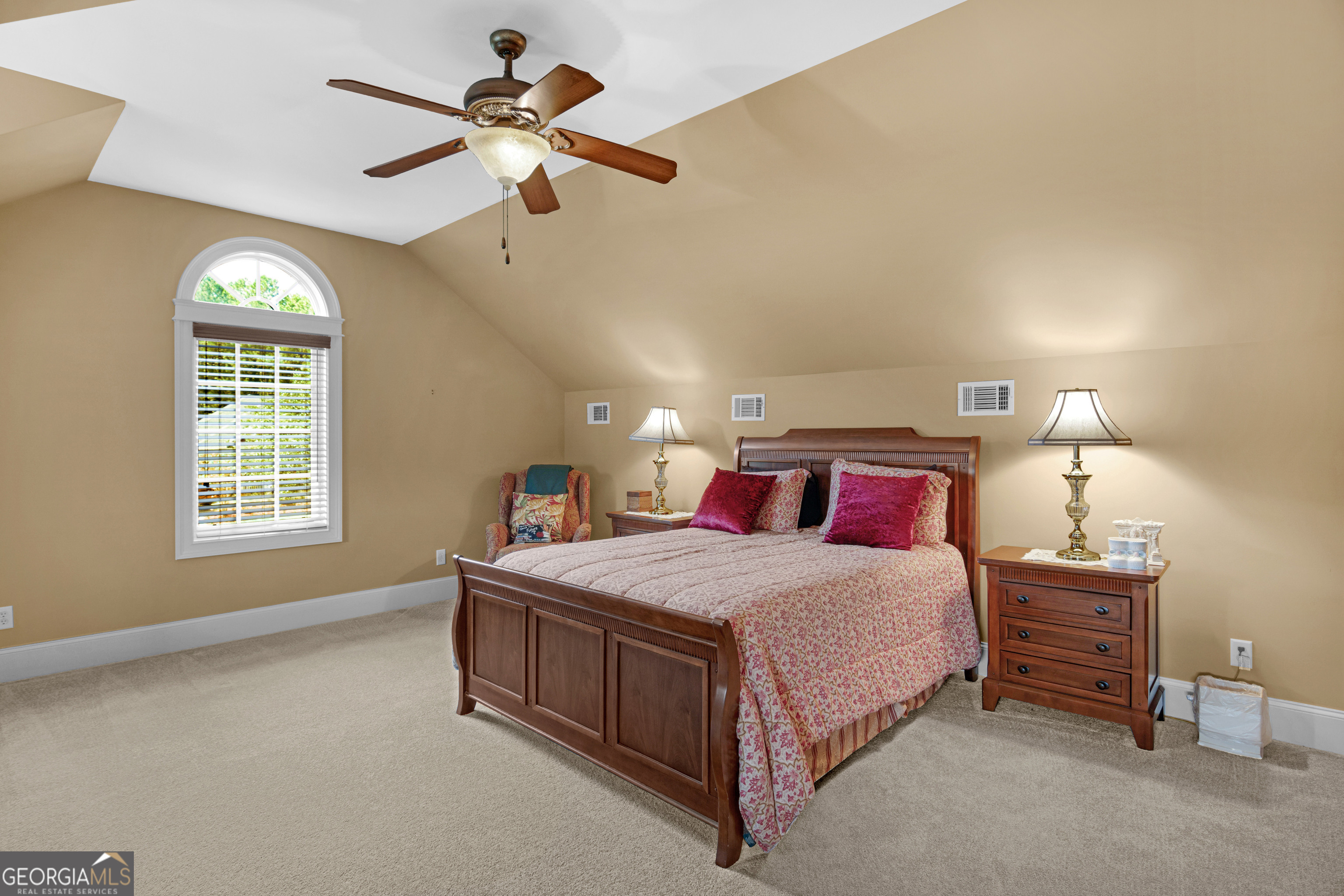 312 Spanton Crescent Pooler, GA 31322 - Photo 41 of 62 a bedroom with a bed chandelier and a window