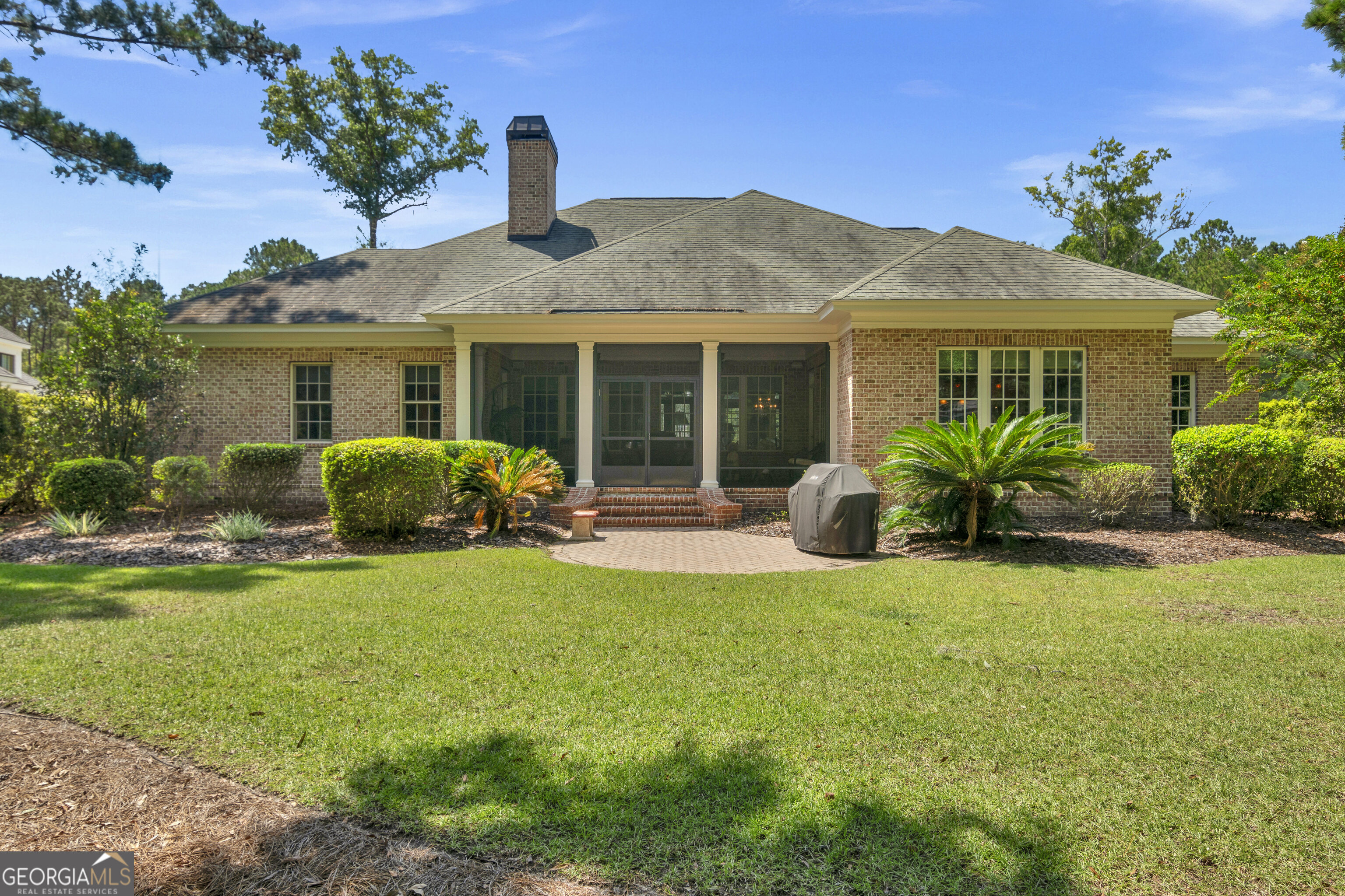 312 Spanton Crescent Pooler, GA 31322 - Photo 45 of 62 a front view of house with yard and outdoor seating