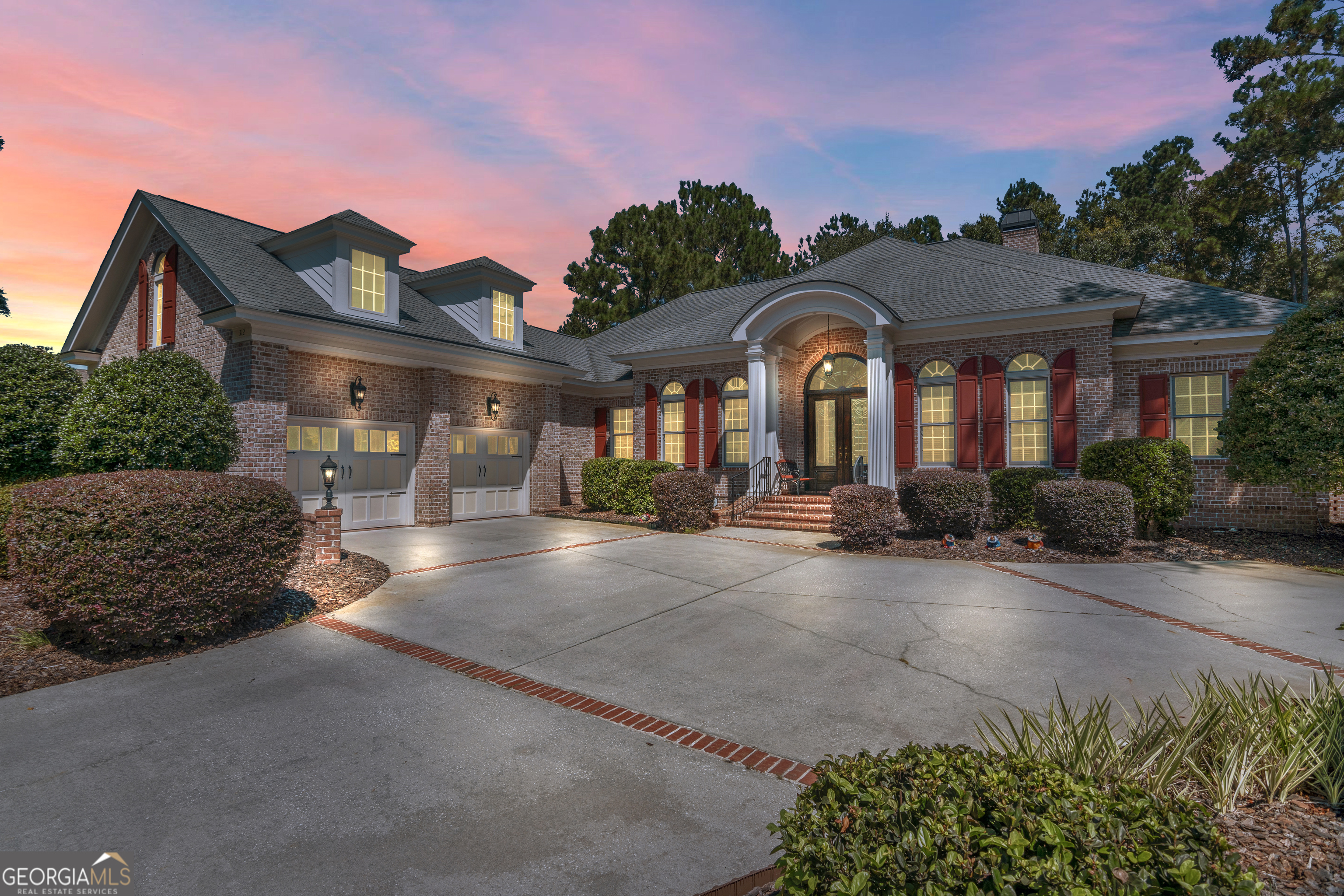 312 Spanton Crescent Pooler, GA 31322 - Photo 52 of 62 a front view of a house with a yard and outdoor seating